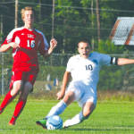 HE SHOOTS.... â€” Fryeburg Academyâ€™s Milos Mojokov turned on the jets and beat a Gray-New Gloucester defender down the left wing, and then unloaded a shot for a first half goal last Friday. Mojokov added a second half goal as the Raiders downed the Patriots 2-0.