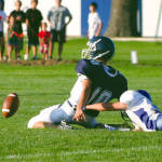 LESSON ON NEVER GIVING UP ON A PLAY â€” Fryeburg Academy quarterback Andrew Rascoe (#10) appeared to have a touchdown during the annual Pleasant Mountain Bowl, but he was hauled down from behind by Lake Regionâ€™s Kyle Stevens, who didnâ€™t give up on the play. Although Fryeburg Academy recovered the loose ball, Stevensâ€™ hustle and saving tackle proved to be a big one as the Laker defense held to keep the game close during last Fridayâ€™s season opener in Fryeburg. (Rivet Photos)