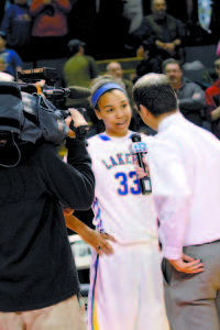 TIANA-JO CARTER was named the Class B West tournament's most valuable player, and is seen here interviewed by Evans Boston of WGME-TV. (Rivet Photo)