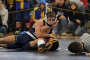 NE CHAMP — Connor Sheehan, a senior at Fryeburg Academy, closed out his high school career with a New England championship Saturday. Here, Connor wrestles in the Maine Class B state tournament. (Rivet Photo)