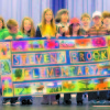 CUT SC sbes banner CONGRATULATIONS TO MRS. GRIGSBY â€” This banner was created by Mrs. Cathy Grigsbyâ€™s special art students over the course of two years. Each student created one panel and one letter using the disperse dye method, which is printed on polyester fabric. The banner will be on permanent display at Stevens Brook. Pictured, left to right are: Jonah Tafuri, Emma Crawford, Cody Chute, Alli Vogel, Hannah Thurston, Mrs. Grigsby, Isabella Wears, Cody Ducette, Grace Ross, Lucas Rogers, Griffin Figueroa, Kayla Currier and Becca Roy. Students absent at the time of the photo were: Tyler Silverblade, Olivia Thompson, Veronica Messina, Haley Fernald and Grace Chute. 