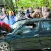 STRONG MESSAGE â€” LRHS juniors and seniors stand along the fenced area to watch emergency personnel attempt to reach victims of the two vehicle mock accident.