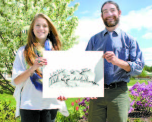 WINNING T-SHIRT DESIGN for the annual Lovell Old Home Days 5K was created by Fryeburg Academy senior Kyra Hunsicker (left), who is pictured with FA art instructor Steve Pullan.