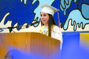 VALEDICTORIAN Kasey Huntress addresses members of the Lake Region Class of 2013 at graduation last Sunday. (Rivet Photo)