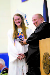 SALUTATORIAN Savannah DeVoe receives her diploma from LR Principal Ted Finn. (Rivet Photo)