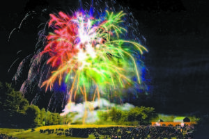 SPLASH OF COLOR IN THE NIGHT SKY â€” Fireworks displays will be held in Bridgton tonight, July 3 at dusk and in Naples on Thursday, July 4. (Photo courtesy of Greg Van Vliet/www.lakeregionphotography.com)