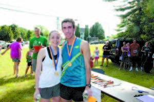 IN THE WINNERS' CIRCLE again at the Sebago Days Fun Run were Christine and Michael Nickerson.