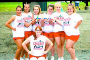 ATTEND CHEERING CAMP â€” Lake Region varsity cheerleaders attending a four-day camp in Bangor included (left to right) Frances Kimball, Jacqueline Laurent, Faith Duquette, Adrianna Merill, Mikayla Fortin and Kacie Tripp along with Coach Samantha Scarf (front). 