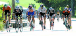 BIG PUSH TO THE FINISH LINE — Ryan Laperle of Bethel (third from the left) broke ahead of the lead pack to win the 2013 Tour de Lovell on Saturday. Laperle just nipped Tony Giguere (second from the left). Riders in the lead pack were (left to right) Spencer Nietmann (#45), Nathan Kenison-Marvin (#31), Matt Reynolds (#55) and Patrick Walker (#3). (Rivet Photos)