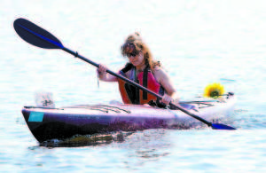 LEARNED FROM EXPERIENCE â€” Lisa Chase of Bridgton switched to a sleek kayak model for this year's Challenge.