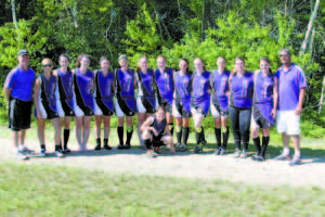 STRONG SHOWING IN SEASON FINALE â€” Coming off a 4-1 record in U-14 play in Bow, N.H. last year, the Maine Panthers moved up in age division to U-16 and found themselves in contention to reach the championship game on July 21. The team included: (left to right) Head Coach Wayne Rivet, Elle Burbank, Casey Heath, Kylie Martin, Kolby Woods, Savanna Morin, Brittany Perreault, Emily Whittemore, Kristen Chipman, Casey Simpson, KK Lorrain, Allison Morse, Ashley Clark and Assistant Coach Troy Morse. (Front) base running extraordinaire and bat girl, Maddie Morse. (Photo by Colleen Simpson)