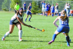 EMILY DAVIDSON fires the ball into the offensive end for Fryeburg Academy. (Rivet Photo)