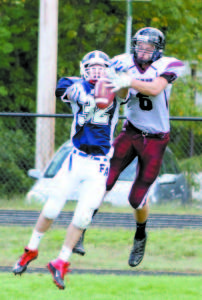 RYAN BUZZELL (#32) intercepts a pass intended for Greely receiver Connor Hanley in the end zone Saturday. (Rivet Photo)