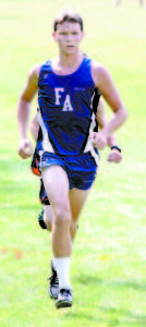 JON BURK placed eighth in the four-school cross-country meet last Friday at York. (Rivet Photo)