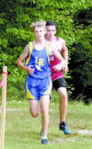 NICK SCARLETT placed 12th last Thursday in the opening cross-country meet held in Wells. (Rivet Photo)