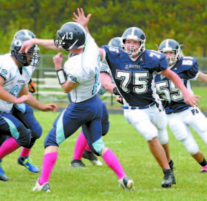 JUST LATE FOR A SACK â€” Fryeburg Academy lineman David McLaughlin arrives just a bit late in an  attempt to sack Oceanside quarterback Hunter Grindle. (Rivet Photo) OCEANSIDE 38 RAIDERS 34 First Downs: FA 13, O 13 Penalties: FA 11-102, O 13-105 Rushing: FA 43-292, O 50-272 Passing: FA 3-9-62, O 1-5-29 Total Offense: FA 354, O 301 Individual Rushing: FA, Ryan Gullikson 17-143, Billy Rascoe 14-72, Ryan Buzzell 4-34, Ben Southwick 7-35, Cody Loewe 1-8; O Hunter Grindle 13-75, Henry Berry 2-5, Isaiah Green 8-14, Garrett Burns 16-90, Preston Spear 11-88 Receiving: FA, Ryan Buzzell 1-3, Brandon Ludwig 1-14, Ben Southwick 1-45; O Logan Finnegan 1-29 FA Tackles (solo, assist, total): David McLaughlin 3-3-6, Billy Rascoe 0-3-3, Greg Sargent 3-0-3, Ben Southwick 3-1-4, Brandon Ludwig 6-3-9, Willy Macfawn 3-6-9, Matt Boucher 2-1-3, Cody Loewe 0-1-1, Greg Harmon 4-4-8, Ryan Buzzell 2-1-3, Kyle Provencher 3-0-3, Andrew Lyman 2-0-2   