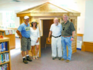 FAMILY PLEASED WITH PROJECT â€” Left to right are George Forney, Barbie DelCamp, Bob Forney and Scott Forney.