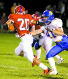 DONOVAN EATON makes a tackle for the Lakers.