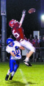 UPENDED â€” Lake Region defensive back Cam Harriman upends Gray-NG receiver Justin McKenna. (Rivet Photos)