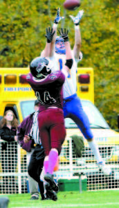 WHAT A GRAB! â€” Lake Region wide receiver Quinn Piland out leaps a Freeport defender along the sideline for a big gain. (Rivet Photos) 