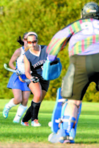 MOUNTING A SCORING BID — Raider senior Emily Davidson heads toward the Lake Region goal. Davidson scored a first half goal to put FA up 1-0.