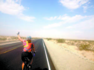 MELISSA PANTER biking through the Mojave Desert on the border of California. The longest ride of 120 miles in one day. 