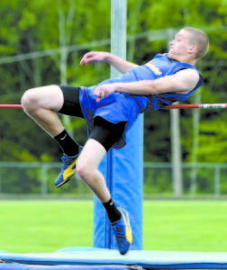 UP AND OVER THE BAR â€” Marcus Devoe of Lake Region clears the bar during high jump competition. (Rivet Photo)