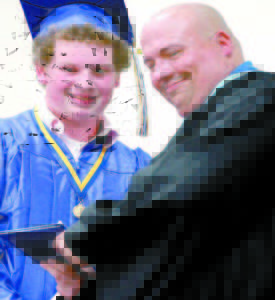Brian Brooks receives his diploma from LRHS Principal Ted Finn.