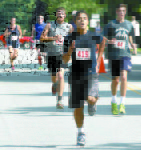 David Sepulueda, 17, Raymond finished in 27:06.