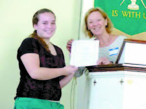 IRISH AWARD RECIPEINT â€” Anna Williams receives the 2014 Joan Irish Award from Moira Yip of the Kezar Lake Watershed Association.  