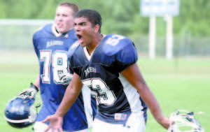 UPSET SPECIAL â€” There was plenty of emotion along the Fryeburg Academy sideline after Saturday's 14-12 upset of Kennebunk. Pictured are Gage Fowler (left) and Angel Escalante.