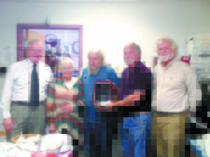 THANKS FOR YEARS OF SERVICE â€” Honoring Mike Fitch (middle) for the years of service to the town of Bridgton at his retirement party were (left to right) Selectman Ken Murphy; Mikeâ€™s wife, Cheryl; Chairman of the Board of Selectmen Bernie King; and Bridgton Town Manager Robert Peabody.
