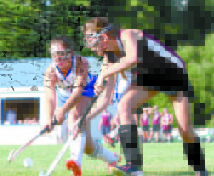 LIZ COLE (left) battles a Greely player for the ball during the season opener. Cole, a sophomore, scored the game winner. PREVIEW: VARSITY FIELD HOCKEY Head Coach: Pauline Webb, second year No JV team: Numbers lowest in history, but middle school numbers on the rise Key Returning Players: Abby Scott-Mitchell, senior, forward; Meghan VanLoan, senior, goalie; Bridgette Letarte, senior, mid; Rachel Bell, senior, back; Molly Christensen, junior, mid. Top Newcomers: Olivia Deschenes, very skilled player with a never-give-up work ethic. Players to watch: Abby Scott-Mitchell, scoring threat; Olivia Deschenes, creates a lot for the team Strengths: Forwards and mids are playing well together early in the season; very coachable; willing to play where Coach Webb needs them. Weaknesses: Low numbers, and most of the subs are backs. Outlook: Coach Webb is encouraged by how the girls are driving the ball up the field and driving much sooner on goal once in the circle. Three Keys to the Season: Stay healthy; play smart and disciplined; and communication on the field. Three Goals: No injuries; make playoffs; and have fun! 
