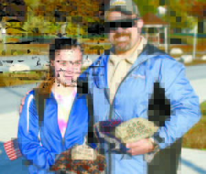 HONORING FALLEN FRIENDS â€” Bailey Crawford was joined by her father, Todd, who served in Iraq. The Crawfords made the hike in honor of two of Todd's fallen friends, Chris Gelineau and Tom Dostie. (Rivet Photo)