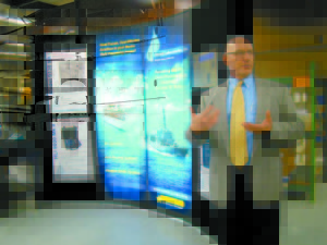 PROUD TO BE THERE â€” Howellâ€™s Vice President of Product Development, Engineering Group John Bliss explains the many types of fluid treatment technologies and commercial marine products the company supplies to the maritime industry, particularly the U.S. Navy.   (Geraghty Photo)   