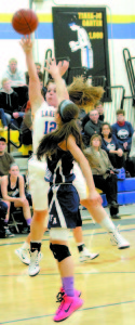 SARAH HANCOCK of Lake Region pulls up for a jumpshot against Fryeburg Academy's Mackenzie Buzzell during Tuesday night's game in Naples. (Rivet Photo) LAKERS (51) Chandler True, Spencer True 1-0-3, Lauren Jakobs 2-0-4, Sarah Hancock 3-13-20, CeCe Hancock 3-4-10, Molly Christensen 1-0-2, Meghan VanLoan 1-0-2, Kristen Huntress 4-1-10, Melody Millett, Devin Langadas, Allison Morse, Alizah Thayer. 3-Pointers: S. True, S. Hancock, Huntress Turnovers: 9 FT: 18-of-30 FG: 14-of-46 Rebounds: 27, S. Hancock 7 RAIDERS (48) Sage Boivin 1-4-6, Kaylin Delaney 3-2-9, Mackenzie Buzzell 2-1-6, Julia Quinn 4-10-19, Lexi Lâ€™Heureux-Carland 1-2-4, Nicole Bennett 0-4-4, Alexandria Fraize, Bridget Bailey 3-Pointers: Delaney, Quinn Turnovers: 12 FT: 23-of-40 FG: 11-of-31 Rebounds: 24, Lâ€™Heureux-Carland 7