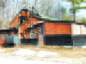 SERIOUS SMOKE DAMAGE resulted from a Dec. 22 fire at this home at 33 Green Street, Bridgton, displacing its owner, Don Miles.
