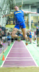 KATE HALL, a senior at Lake Region High School, set two all-time New England marks in the 55-meter dash and long jump at the Reggie Lewis Center in Boston. (File Photo)