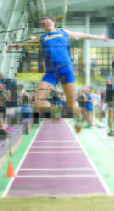 KATE HALL, a senior at Lake Region High School, set two all-time New England marks in the 55-meter dash and long jump at the Reggie Lewis Center in Boston. (File Photo)