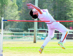 Victor Yang clears the high jump bar. (Photo by Brea McDonald Photography)