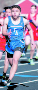 Spencer Thomas sprints toward the finish line. (Photo by Brea McDonald Photography)