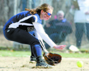 SCOOPED â€” Raider second baseman Julia Quinn scoops up a ground ball during recent varsity softball action. (Rivet Photo)