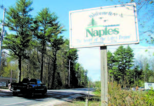 A SIGN MARKS the town boundary between Casco and Naples along Route 11. The Town of Naples is pricing signs for major and minor roads. (De Busk Photo)  