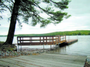 THE BOAT LAUNCH at the Town Beach is reserved for Naples taxpayers. However, if passed at the Town Meeting, the use could be offered to nonresidents for a fee. (De Busk Photo) 