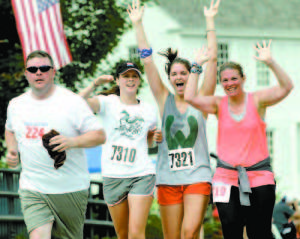 Jarrod Wiswell of Bridgton, Emily Macdonald and Wallace Gaillard of Camp Wyonegonic and Julie Gelardi of Framingham, Mass.