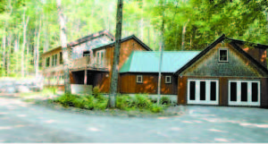 LEAâ€™s Maine Lake Science Center nestled in the woods adjacent to Pondicherry Park. (Photo by Bridie McGreavy)     