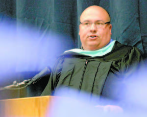 SPEAKING AT GRADUATION Principal Ted Finn who is now moving on to Gray-New Gloucester High School this fall. (Rivet Photo)