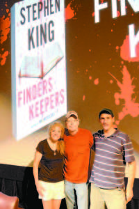 PHOTO OPP WITH THE KING OF HORROR â€” Bridgton Book store owners Pam and Justin Ward pose for a photo with author Stephen King. (Photo by Rachel Damon)