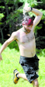 TRYING TO COOL DOWN after reaching the summit of Pleasant Mountain is Chris Pingree Felts of Naples. (Rivet Photo)