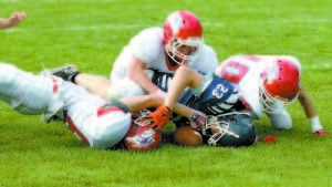 FIGHT FOR POSSESSION — Fryeburg's Cody Gullikson tries to secure the loose ball after a fumble into the end zone with time expiring Saturday against Gray-NG. The Patriots came up with the fumble, and hung on for a 22-20 victory over the Raiders. (Rivet Photo) GRAY-NG 22, RAIDERS 20 First Downs: FA 19, GNG 3 Penalties: FA 7-65, GNG 8-56 Turnovers: FA 5, GNG 1 Passing: FA 19-for-40, 200 yards; GNG 5-for-8, 63 yards Rushing: FA 31-252, GNG 31-226 FA rushing: Ryan Gullikson 25-232, Cody Gullikson 6-20 G-NG rushing: Austin Chase 18-198, Elijah Simmons 4-15, Justice Bowie 8-12, Zack Haskell 1-1 FA receiving: Oscar Saunders 3-58, Nick L’Heureux-Carland 6-70, Scott Parker 3-26, Alex Ehrensberger 1-11, Cody Gullikson 6-35 G-NG receiving: Zack Haskell 4-45, Tristan Herod 1-18 FA tackles (solo, assist, total): Alex Ehrensberger 1-3-4, Cody Gullikson 4-3-7, Matt Boucher 2-6-8, Gage Fowler 2-1-3, Ryan Gullikson 1-1-2, Scott Parker 0-1-1, Cobey Johnson 1-1-2, Baha Demir 0-1-1, Nick L’Heureux-Carland 4-1-5, Oscar Saunders 2-0-2, Kevin Ventura 0-2-2, Isaac Wakefield 1-1-2 Up next: The Raiders (0-2) travel to Wells (2-0) Friday, game time 7 p.m.